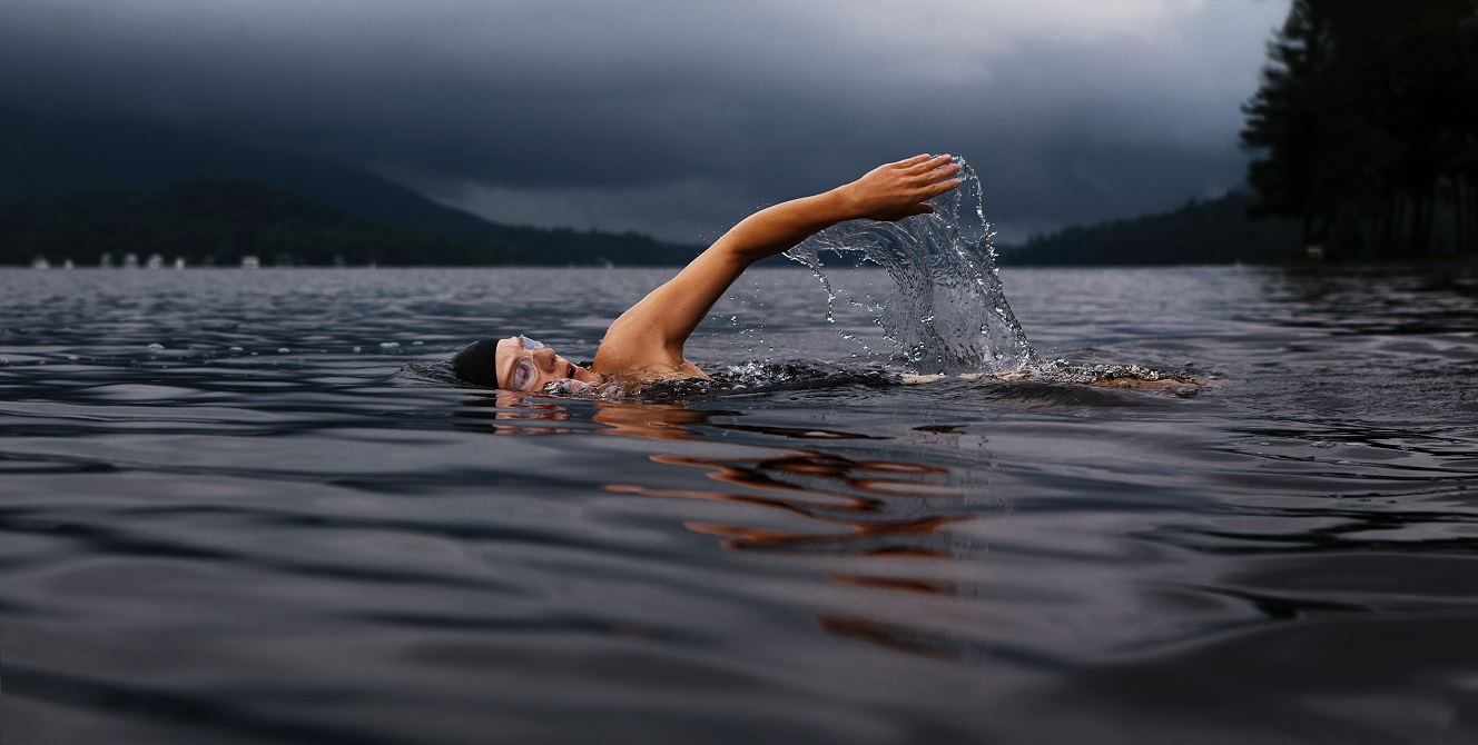 Photo of Dude performing active recovery by swimming